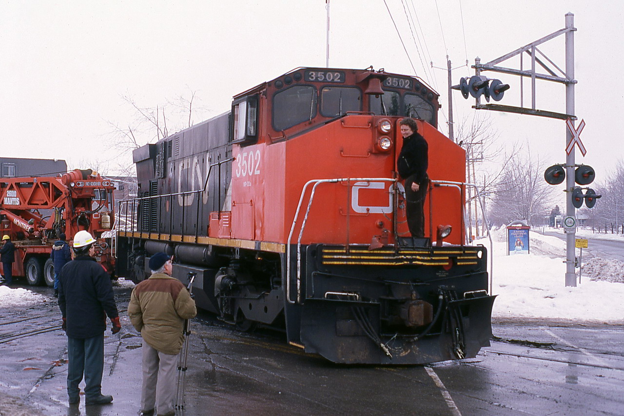 rerailing 3502 after having been lent to the town during the ice storm crisis that lasted 7-8 days.