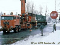 rerailing 3502 after having been lent to the town during the ice storm crisis that lasted 7-8 days.