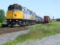 VIA 659,the Tim Horton special back to Toronto from Quebec with helper 6410 passes CN 401 with 5358 and WC 6914.This is the 2nd TH ,the 1st one being 657 30 minutes before.