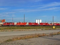 Surprises are nice. Looking at some new angles to shoot the yard ended up seeing The Havelock Consist picking up their GP-9 8216 from the locomotive storage area 