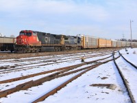 After quite a boring day, 232 rolls through Hamilton Yard with CN 2201 and CSXT 7627. The 2201 is the second Dash 9-44CW that CN purchased with distributed power, as denoted by the first two digits in the engine number.