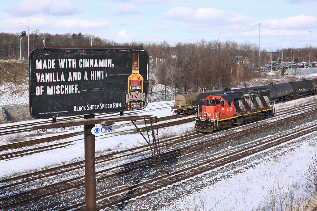 CN 4701 takes track one out of the east end of Aldershot Yard to wye itself at Bayview. It will return to lead 557 to Burloak to service industry along the Oakville Subdivision.