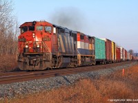 CN train 369 is at the west end of the new alignment, built circa 1912, through Newtonville behind CN 2421 and BCOL 4607. 1513hrs.