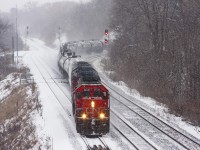 Coming off the Dundas sub and making good timing this GMD SD40u CN 6006 leads CN 332 into bayview jct.