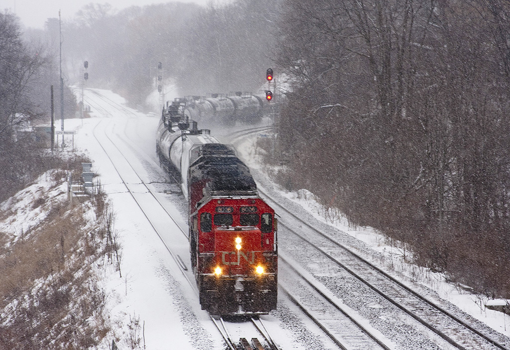 Coming off the Dundas sub and making good timing this GMD SD40u CN 6006 leads CN 332 into bayview jct.