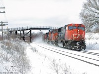 One of my first trips out to Lovekin in 2008 yielded an eastbound manifest lead by 5778 in fresh snow.