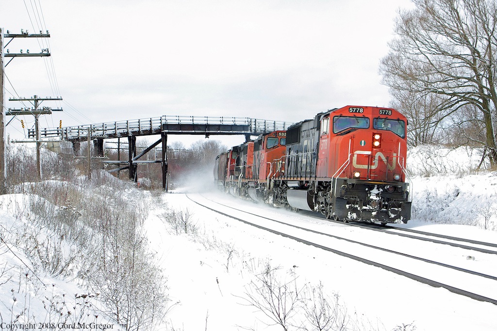 One of my first trips out to Lovekin in 2008 yielded an eastbound manifest lead by 5778 in fresh snow.