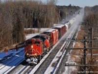 CN 373 flies past the maintainers working on the new third track west of Grafton behind 8905, 5745 and mid train DPU 2665. 1244hrs.