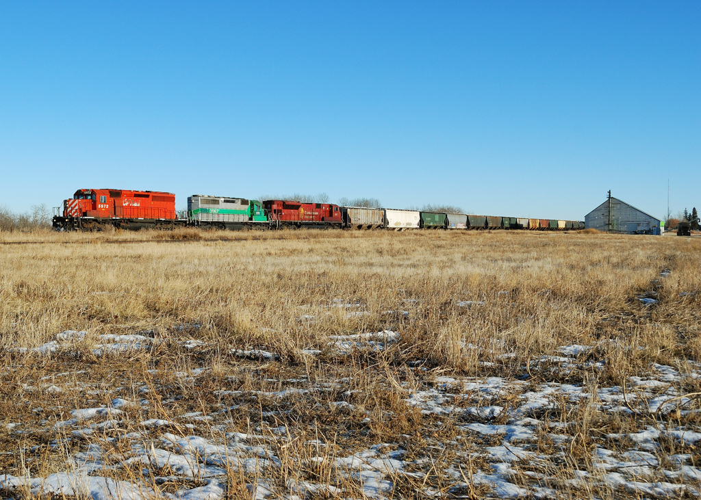 A nice variety of EMD power including a citx ex furx leasor depart westbound for Saskatoon.