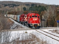 CP 3048, 3032, and 3111 pass by Balsam as Gord gets off his perch. Have ladder, will railfan. 0932hrs.