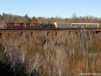 AZER 6070 trains CP 9650 and 9594 on train 235 as they cross the Cherrywood trestle in north Pickering, Ontario. 1236hrs.