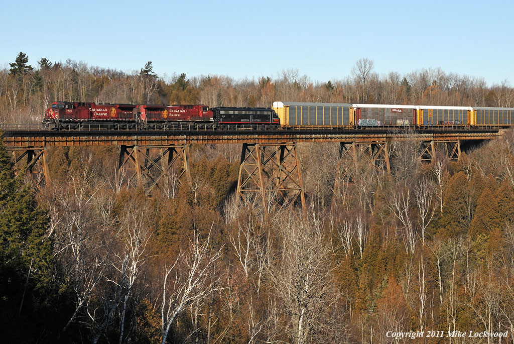 AZER 6070 trains CP 9650 and 9594 on train 235 as they cross the Cherrywood trestle in north Pickering, Ontario. 1236hrs.