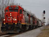 CN 439 led by a GP38-2 and a pair of GP9RM's, heads westbound towards Windsor on its return trip from London.