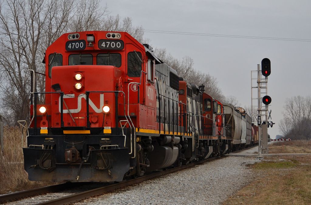 CN 439 led by a GP38-2 and a pair of GP9RM\'s, heads westbound towards Windsor on its return trip from London.