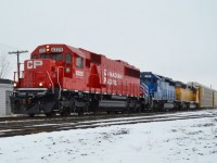 CP 242 led by freshly rebuilt CP 6225 ex SOO, CEFX 3181 and CEFX 2791 charges eastbound thru Tilbury with this autorack train.