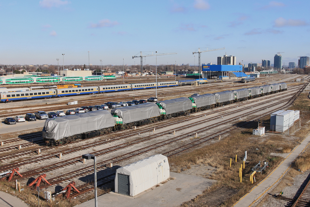 Ten F59PHs sit covered up at VIA\'s TMC yard in Toronto.