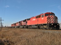 CP 9021 leads 210 with sd90/43mac 2 SD40-2\'s and GP38-2 3117 at Rotave siding. At the time of this photo lashups on 210 were often like this as CP as starting to send engines to Winnipeg for storage during the recession.