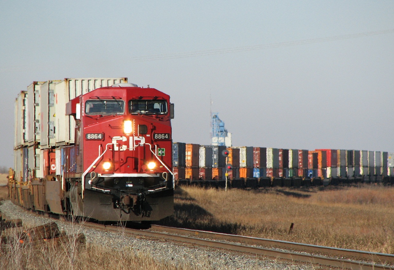 CP 8864 leads old 102 at Hargrave as it rounds the curve and heads towards Virden Manitoba. Similar to 11/02/2011 there was also no snow on the ground during that time.