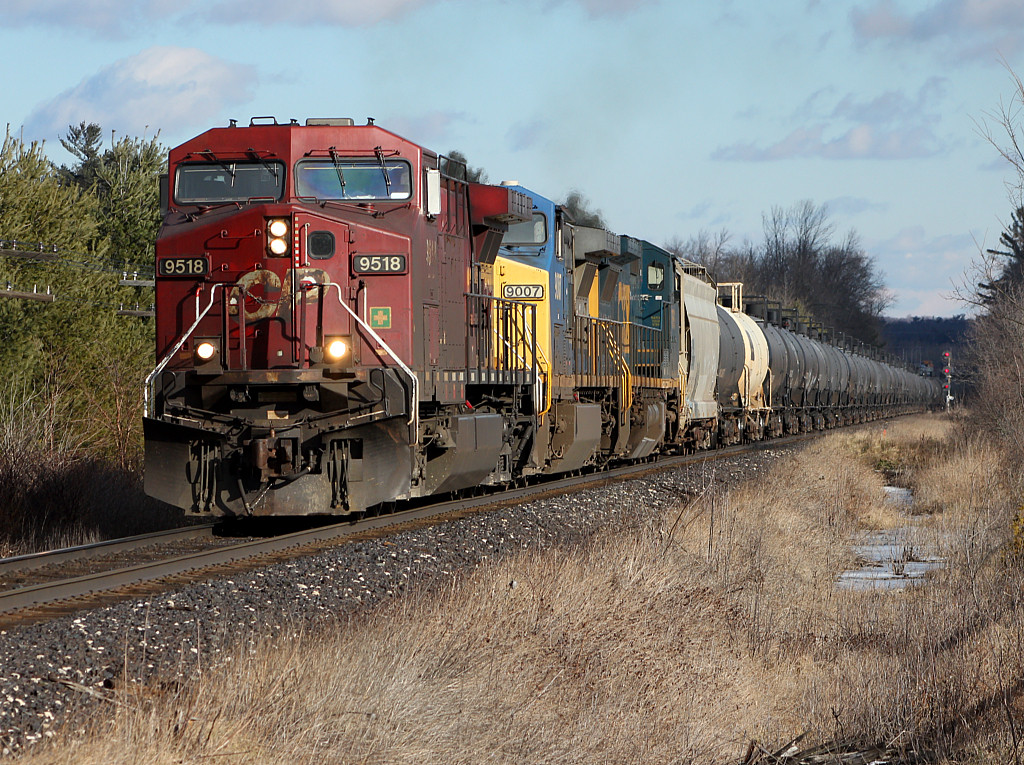 CP 627 departs Guelph Jct, with a two American visitors assisting.