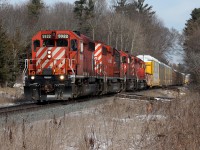 CP 441, led by an amazing lashup of four SD40-2s all in action red paint, approach Ayr ON. 