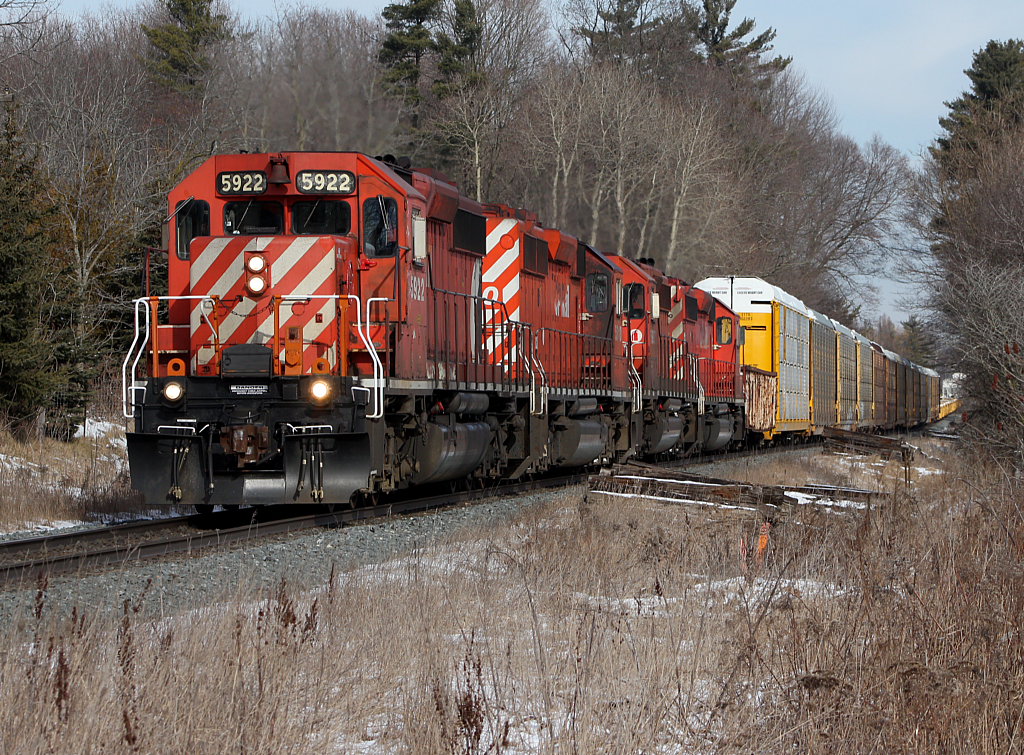 CP 441, led by an amazing lashup of four SD40-2s all in action red paint, approach Ayr ON.