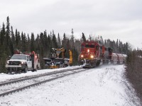 Sharing the road.... Cleared in the siding at MacDuff, CN L520 passes us with a 67 car heavy freight from the CN/ACR