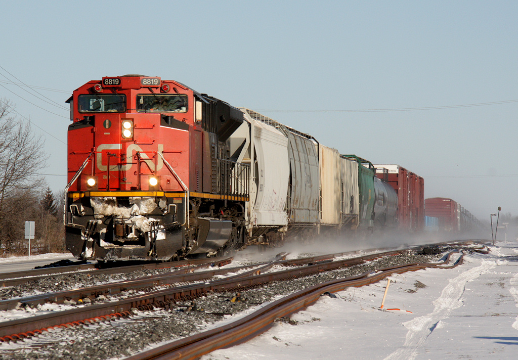 CN M30511 14 heads towards Belleville passing over the New Quinte plant at mile 217 of the Kingston Sub