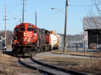 Since changing ties through here in 2010 I was hoping to get a shot with Cameco in the back ground, but with the sun and this train always runs mid morning I guess that is impossible... Here train 518 delivers one car to a long time single carload customer.