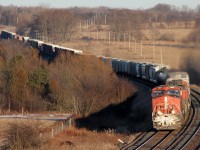 CN M36921 17 heads through Newtonville with a short train, lifted quite a bit from Belleville... Dosent like like a 369 today, no lumber...