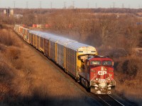 CP\'s hotshot 112 makes time through mile 151 of the Belleville Sub with 7000\' of stacks & racks
