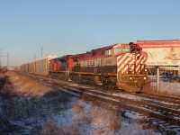 CN Q14921 21 heads down the North past Georges Trains about to meet train M37631 21 at mile 15 of the York Sub