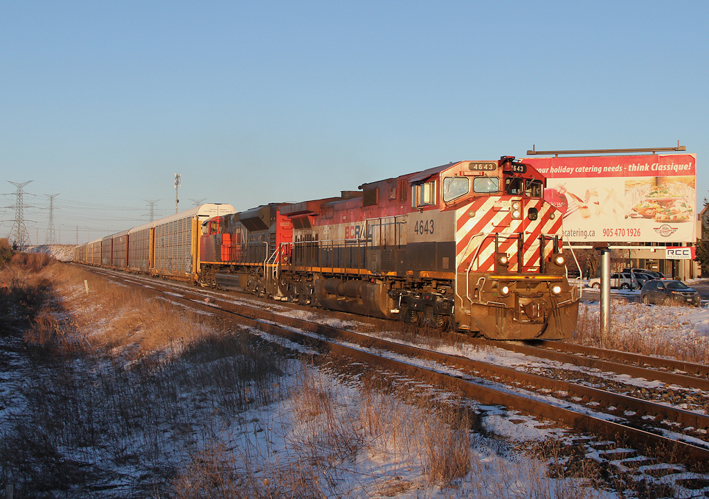 CN Q14921 21 heads down the North past Georges Trains about to meet train M37631 21 at mile 15 of the York Sub