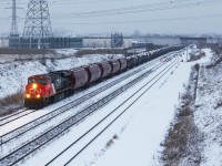 CN M305 is a kind of a big deal around these parts today with 8000+ feet of train behind the lead GEVO...with the help of another ES44DC somewhere there in the middle as both units lug their shares of this monster into Mac Yard.