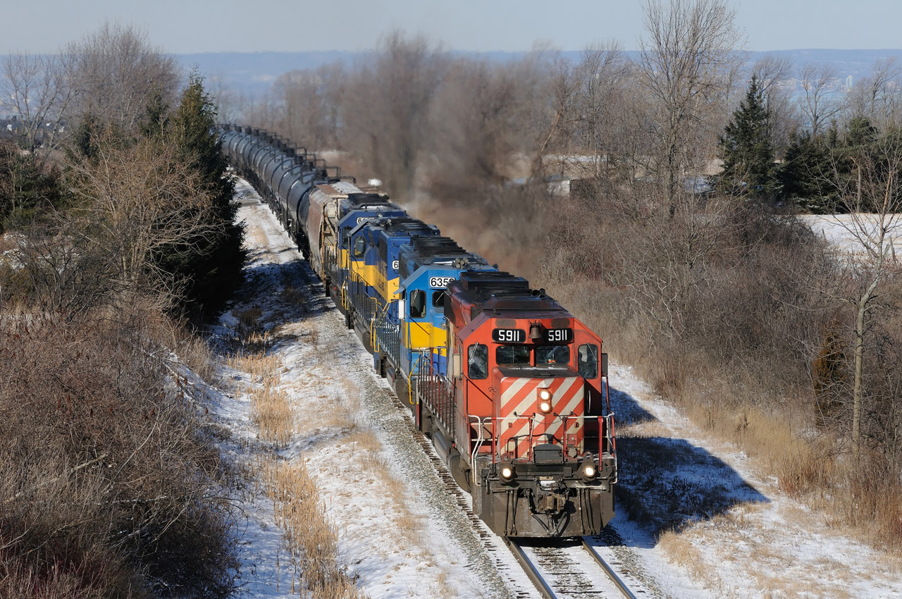 Ethanol train CP 626 crests the Niagara escarpment at Vinemount, Ontario. CP 5911 - DME 6359 -  ICE 6422 - ICE 6446.