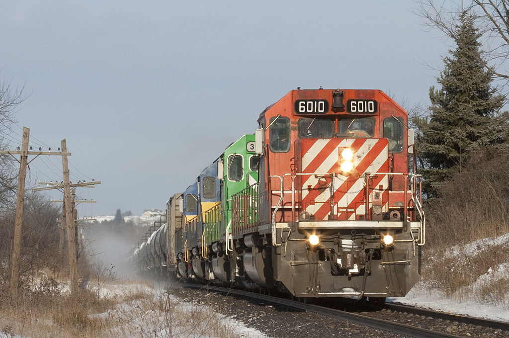 CP 627 CP 6010, CITX 3062, DME 6369, DME 6056 hustle across the galt sub on the approach to SNS Puslinch CP Galt sub Mile 45.6