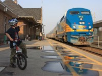 VIA 87 prepares to depart brampton VIA station as a young railfan looks on and waves to the crew