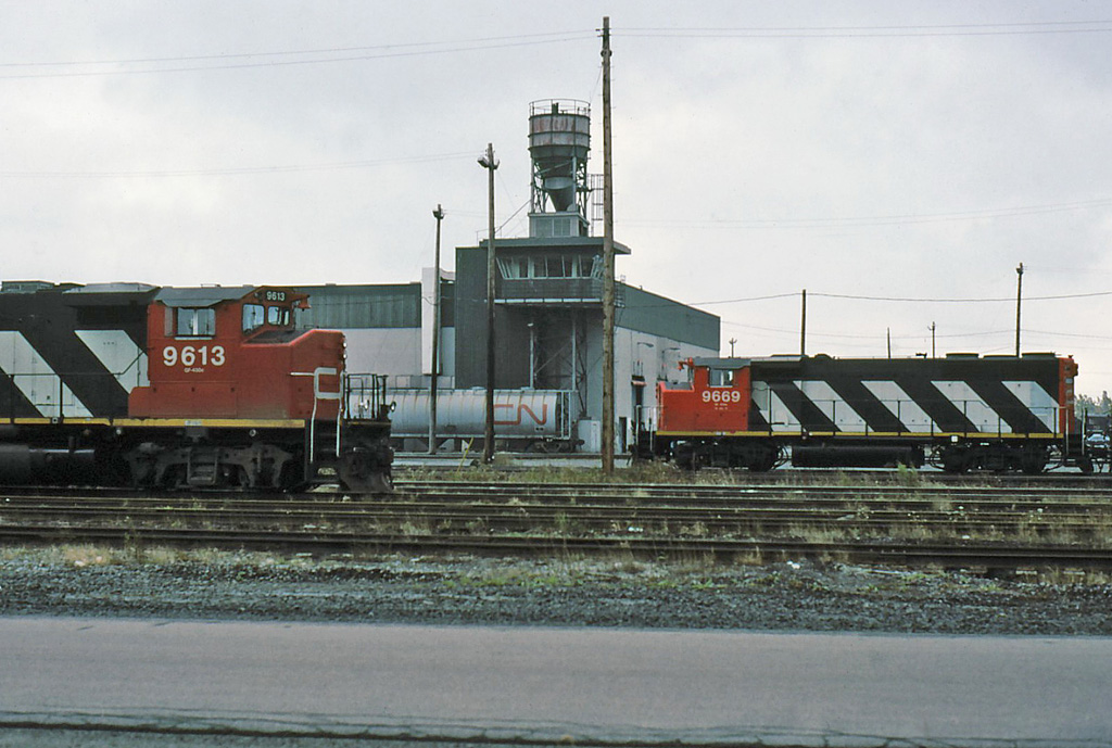 \" GP-40s idle beside the Taschereau yard DS.
