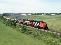 CN 312 about to pass under HW 55 .