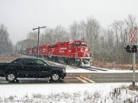 3038 leads T07 through a blizzard,and meets with an Avalanche in Whitby.