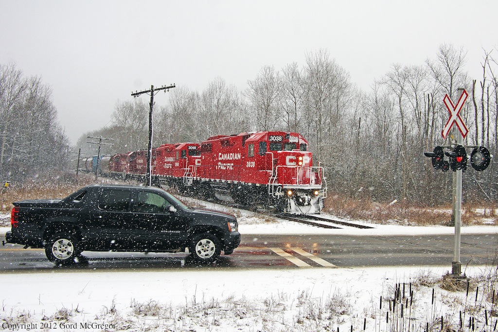 3038 leads T07 through a blizzard,and meets with an Avalanche in Whitby.