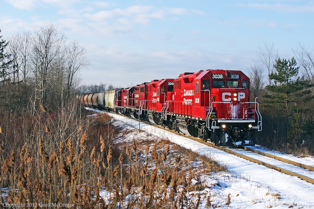 Picking up 8243 a GP9 switcher,3038 was back in lead with the snow of the previous day still on her nose.