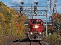 Westbound in gorgeous fall colours, train 426 makes their way through Rosedale in afternoon fall light. Photo taken with the Sony 70-400 F4-5.6 G SSM lens. 