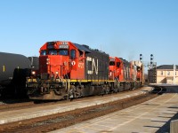 393 making it's way past Brantford with a friendly wave from the conductor