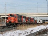 After shooting a detouring intermodal with a BNSF+Ferromex unit, and a solid army train special, I thought I had used up all my lucky charms of the day. And then this falls into my lap out of nowhere. CN 4729, 4139, 7026 and 7027 (sisters!) on a special dimensional move #547 with a large generator load pulling up to Bramalea GO station. There were employees following this movement, making sure the generator cleared the overpasses and signal bridges along the line.