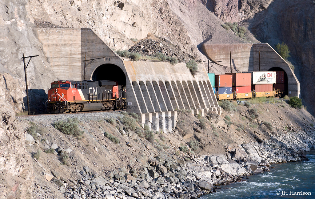 CN 2318 (ES44DC) with the 8919 (SD70M-2) trailing and headed west at the Skoona Tunnels.