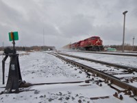 CP 8788 charges an eastbound manifest through Guelph Junction after a light snow