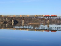 CP 5987 and 5978 lead mixed freight across the Grand River on a pristine Saturday morning.