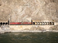 CP 8870, a GE ES44AC w/ the 9723, an AC44CW trailing, head west along the Thompson River at the Skoona Tunnels which are located near Spences Bridge B.C.