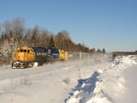 CN X69831 26 - ONT 1802 South kicking up the snow in Falkenburg making up for a bit of lost time after a meet at Martins, transporting Canadian and American troops to Washago to meet their ride back to Base Borden from winter training exercises in the Cochrane area.