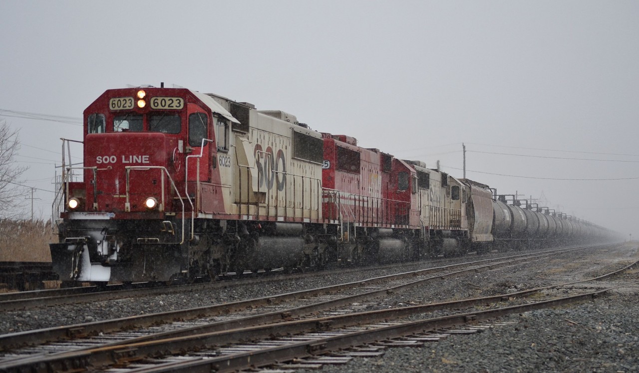 CP 642 led by a trio of SOOs charges thru Tilbury with this ethanol train just as the snow starts to come down heavy. This will probably be one of the last times to see a lashup like this unfortunately.